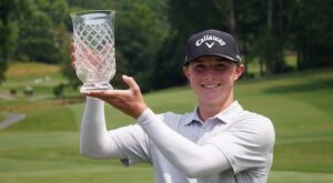Blades Brown poses with the trophy after winning the 2023 AJGA Wyndham Invitational presented by Odyssey. (Courtesy of American Junior Golf Association)